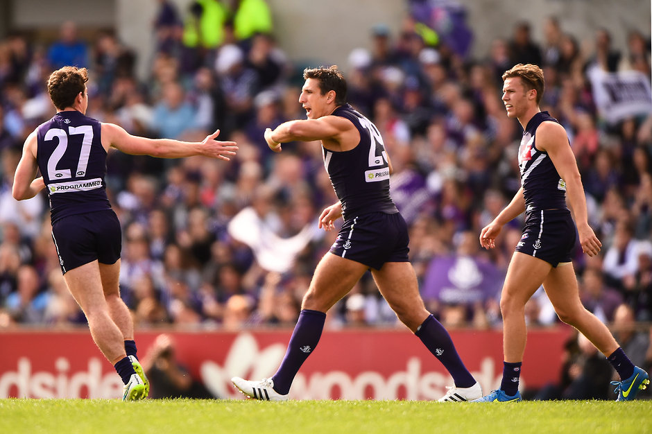 AFL 2015 Rd 22 - Fremantle v Melbourne PERTH, AUSTRALIA - AUGUST 30: Matthew Pavlich and Lachie Neale of the Fremantle Dockers celebrates a goal during the 2015 AFL round 22 match between the Fremantle Dockers and the Melbourne Demons at Domain Stadium, Perth, Australia on August 30, 2015. (Photo by Daniel Carson/AFL Media)